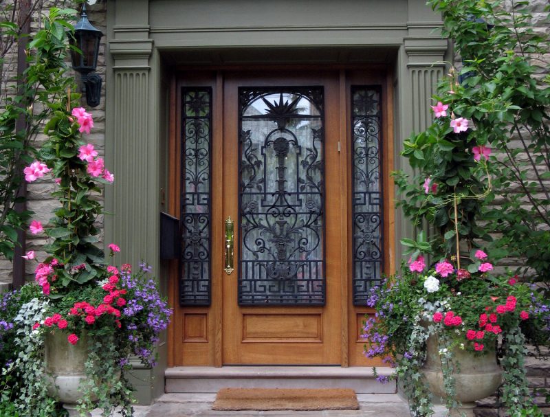 beautiful front door with flowers